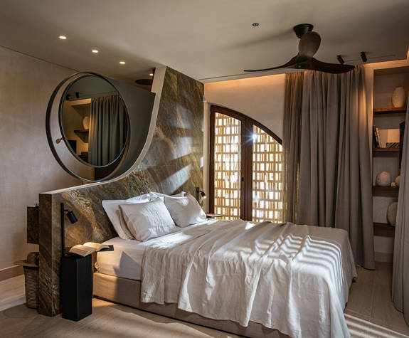 The Echo Of The Sea Beachfront Villa decorated bedroom with double bed