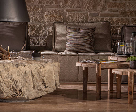 The Echo Of The Sea Beachfront Villa small round tables next to the fireplace