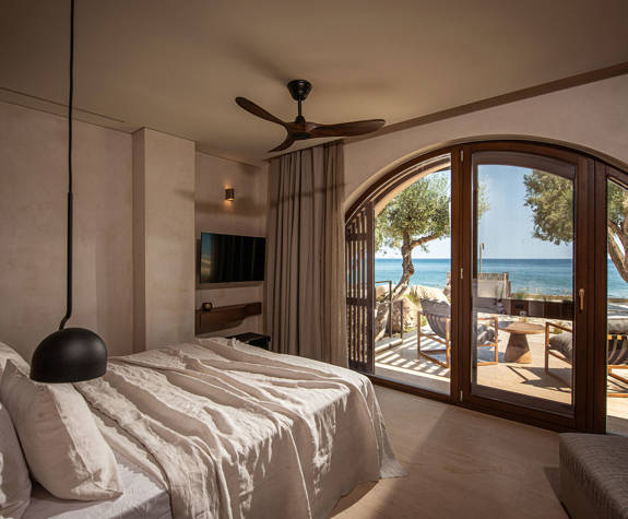 The Echo Of The Sea Beachfront Villa bedroom with terrace view