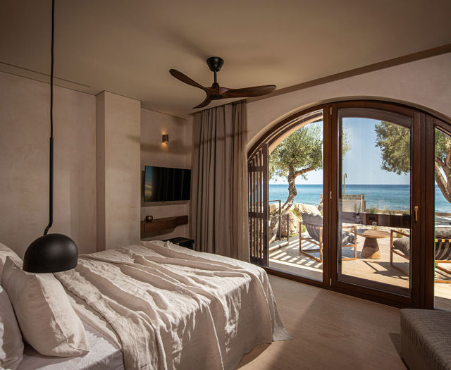 The Echo Of The Sea Beachfront Villa bedroom with terrace view