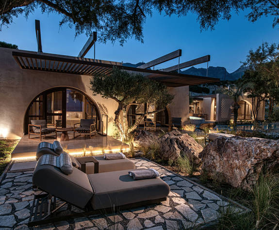 The Echo Of The Sea Beachfront Villa garden with sunbeds and terrace view