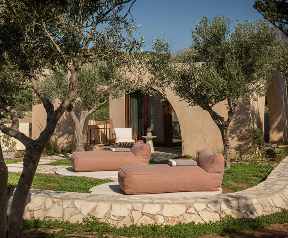 The Echo Of The Sea Beachfront Villa terrace with two sunbeds