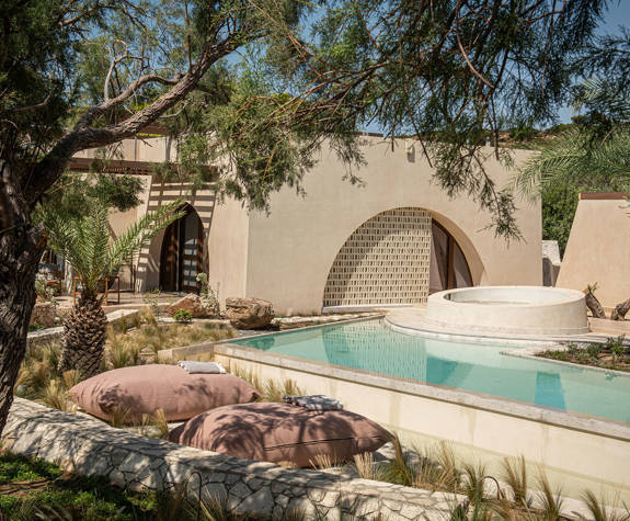 The Echo Of The Sea Beachfront Villa pool view with the villa in the background
