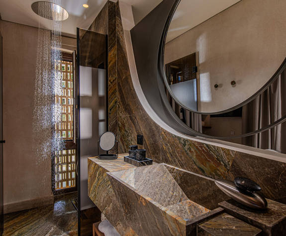 The Echo Of The Sea Beachfront Villa shower and washbasin